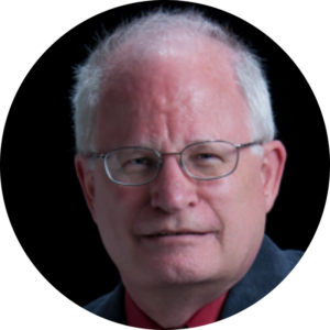 Professional headshot of Arnie Buss
