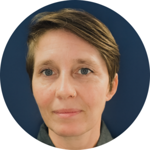 Professional headshot of Reine Hewitt